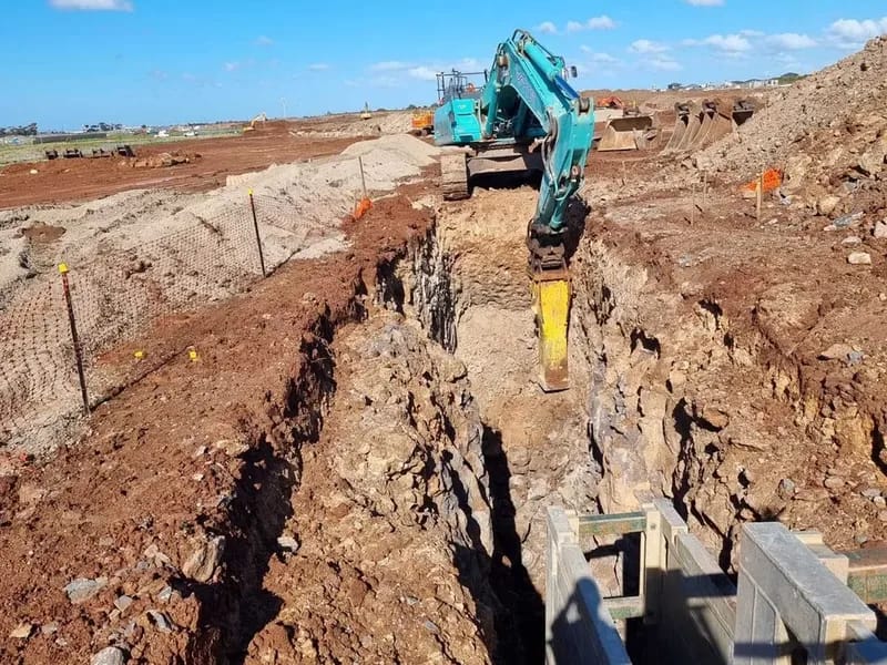 Deep excavation with shoring systems installed for safe pipeline construction